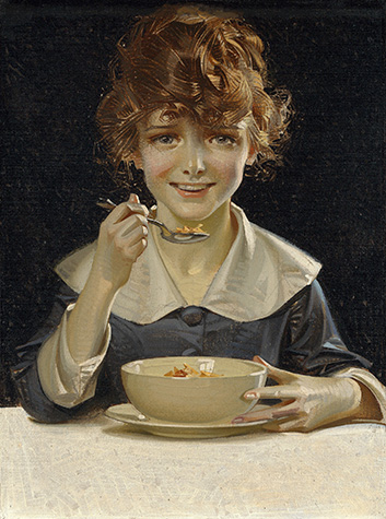 Young girl eating cereal with a sppon. She is wearing a blue dress with a white collar and sitting in front of a dark background.